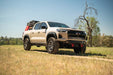 Chevy Colorado ZR2 with Spec Series Front Bumper and off-road equipment on a grassy field