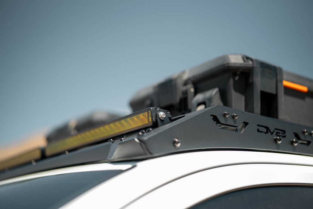 Roof Rack Light Mount for the 4th Gen Toyota Tacoma Roof Rack with a blurred background
