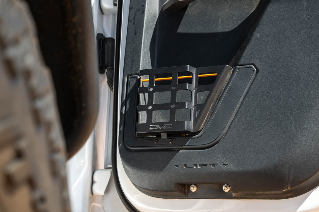 Bronco rear door molle pocket, installed with warm sun shining on it.