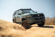 6th Gen Toyota 4Runner Centric Winch Front Bumper, on a dirt road with clear sky