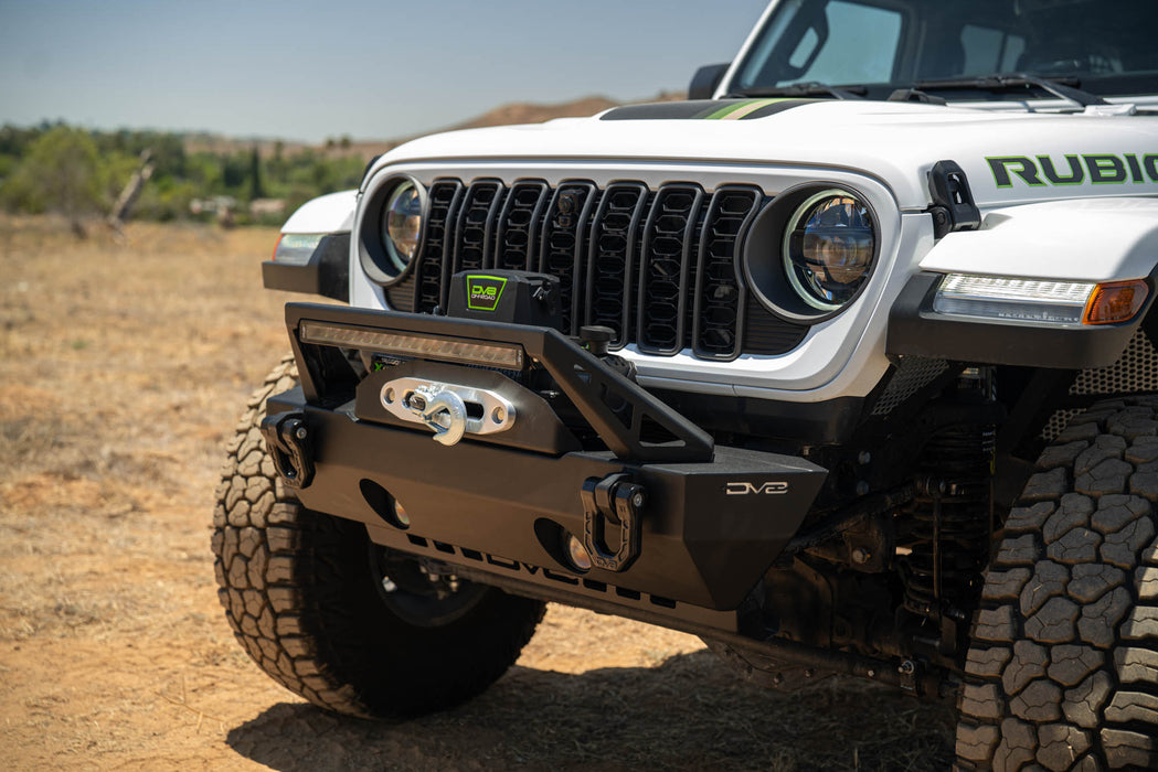 DV8 Xtract 12k Synthetic Rope Winch fits standard winch mounting points.