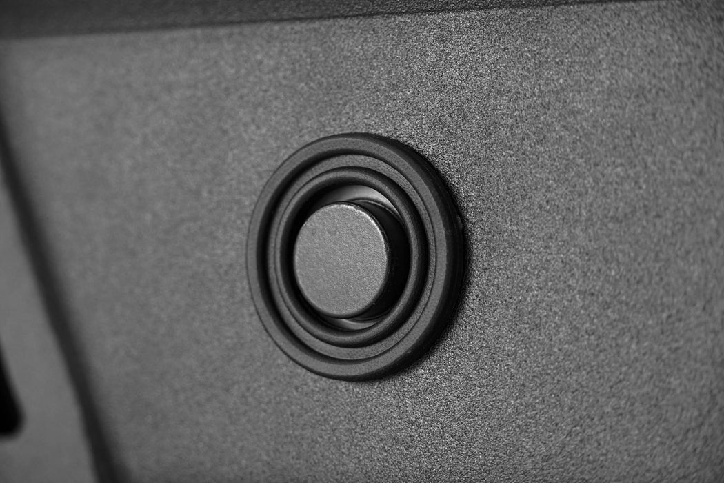 A DV8 Sensor Bezel replacing the OEM sensor bezel in an aftermarket bumper.