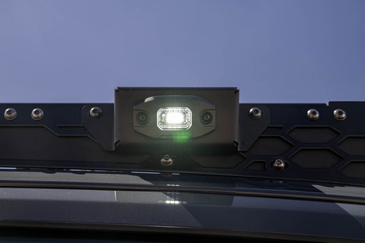 DV8 Micro Elite Utility Light mounted on a roof rack